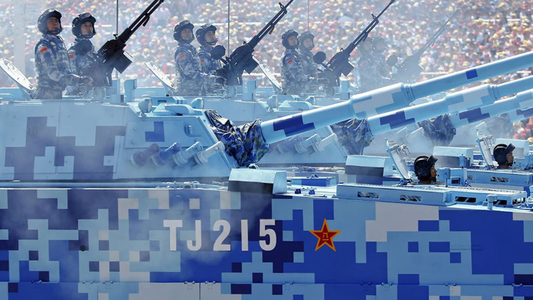 Chinese People's Liberation Army Navy (PLAN) marines roll on their armoured vehicles through Tiananmen Square during the military parade marking the 70th anniversary of the end of World War Two.