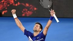 Novak  Djokovic celebrating victory.