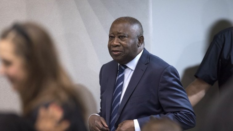 Former Ivory Coast President Laurent Gbagbo enters the courtroom of the International Criminal Court  in The Hague.