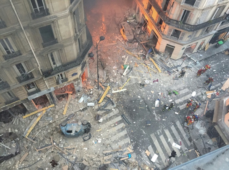A woman's body has been found under the rubble following Saturday's massive blast in Paris, which also killed two firefighters and a Spanish tourist