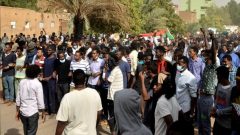 Sudanese demonstrators gather as they participate in anti-government protests in Khartoum, Sudan.