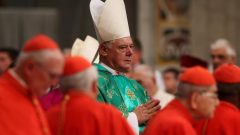 Newly elected cardinal Gerhard Ludwig Muller of Germany arrives during a consistory ceremony led by Pope Francis in Saint Peter's Basilica at the Vatican February 22, 2014.
