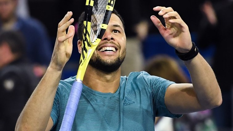 France's Jo-Wilfried Tsonga celebrates after winning the final of the Open Sud de France ATP World Tour.