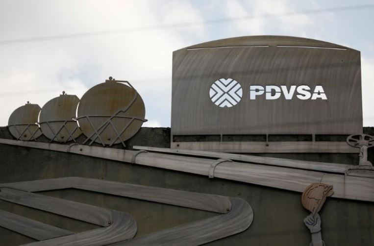Cutouts depicting images of oil operations are seen outside a building of Venezuela's state oil company PDVSA in Caracas, Venezuela.