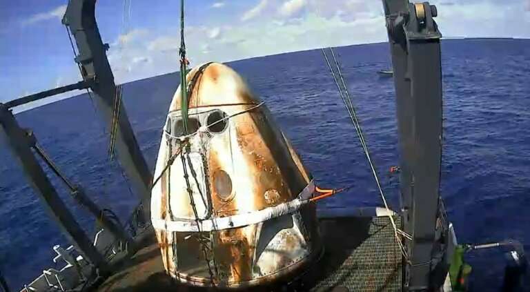 SpaceX's Crew Dragon spacecraft safely aboard the company's recovery vessel.