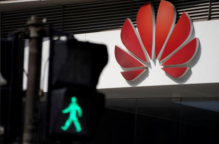 A Huawei company logo is seen outside a shopping mall in Shanghai, China