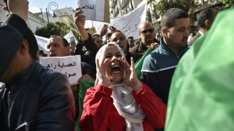 An Algerian protester shouts slogans during an anti-system demonstration in the capital Algiers.