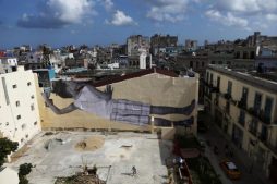 A giant photograph of a boy by French photographer and artist JR is seen on a wall, during the 13th Havana Biennial, in Havana, Cuba.