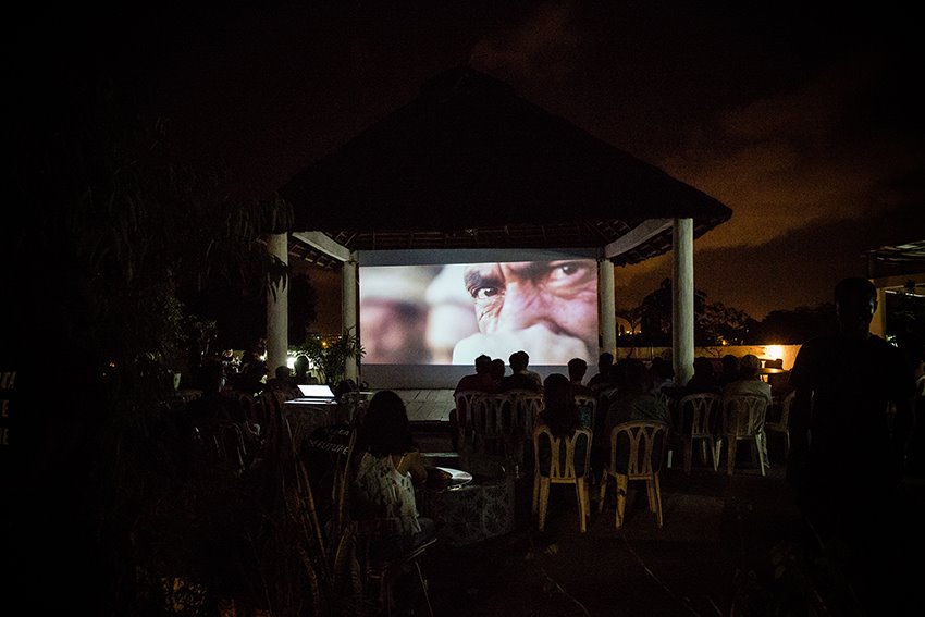 People watching a film at the annual Bushman Film Festival