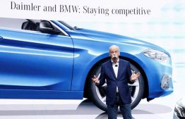 Dieter Zetsche, CEO of Daimler AG, talks about the Daimler - BMW collaboration on the Mercedes stand at the 89th Geneva International Motor Show in Geneva.
