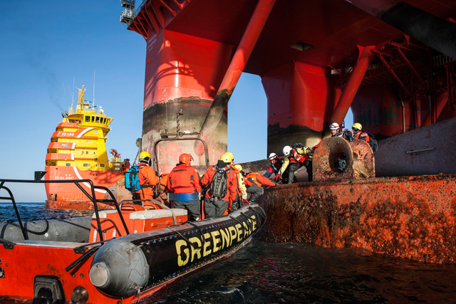 Four activists climbed aboard the West Hercules rig, the organisation said.
