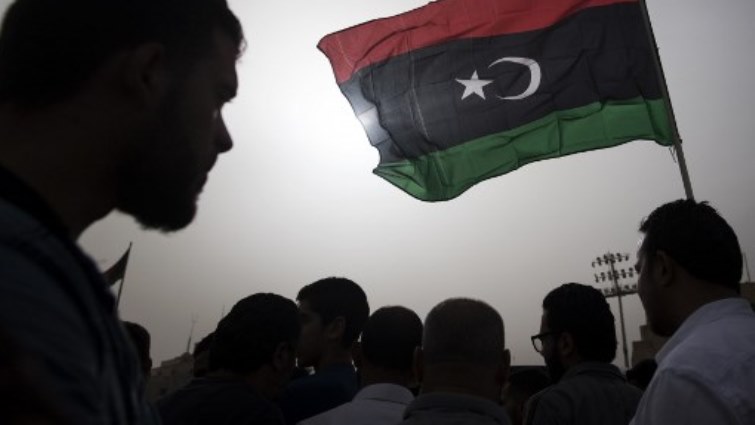 Libyans gather during the funeral of fighters loyal to the Government of National Accord (GNA) in the capital Tripoli.