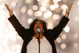 Aretha Franklin performs the Star-Spangled Banner on the National Mall during the 2003 NFL Kickoff Live concert in Washington.