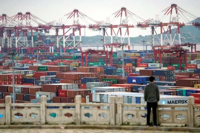 Containers are seen at the Yangshan Deep Water Port in Shanghai.
