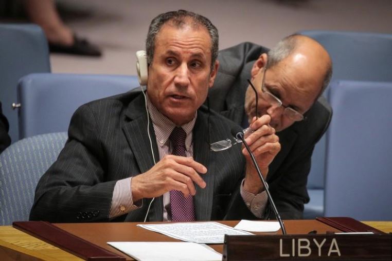 Libya's UN Ambassador Elmahdi Elmajerbi, attends a United Nations Security Council meeting at U.N. headquarters in New York.