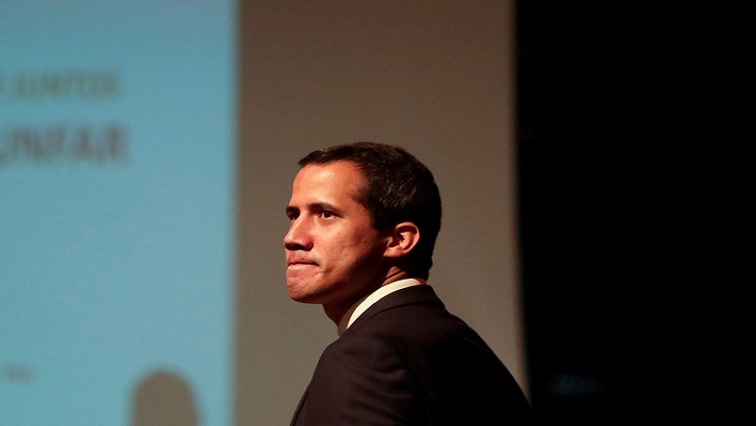 Venezuelan opposition leader Juan Guaido, who many nations have recognised as the country's rightful interim ruler, arrives on stage to deliver a speech during a meeting with workers of Venezuela's state oil company PDVSA in Caracas, Venezuela, May 3, 2019.