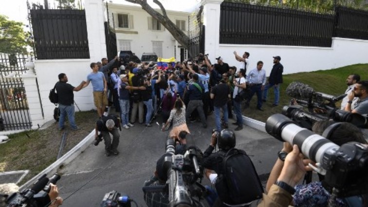 Venezuelan high-profile opposition politician Leopoldo Lopez (C) speaks outside the Spanish embassy in Caracas.
