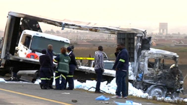 People standing at the crash scene