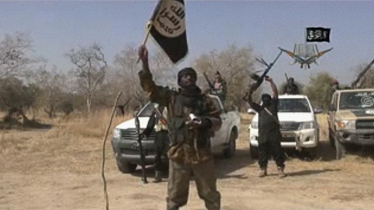 Boko Haram leader Abubakar Shekau in front of his fighters