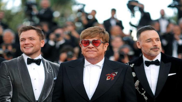 Elton John in the middle