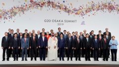 Leaders and delegates attend a family photo session at the G20 leaders summit in Osaka, Japan, June 28, 2019. REUTERS/Kevin Lamarque