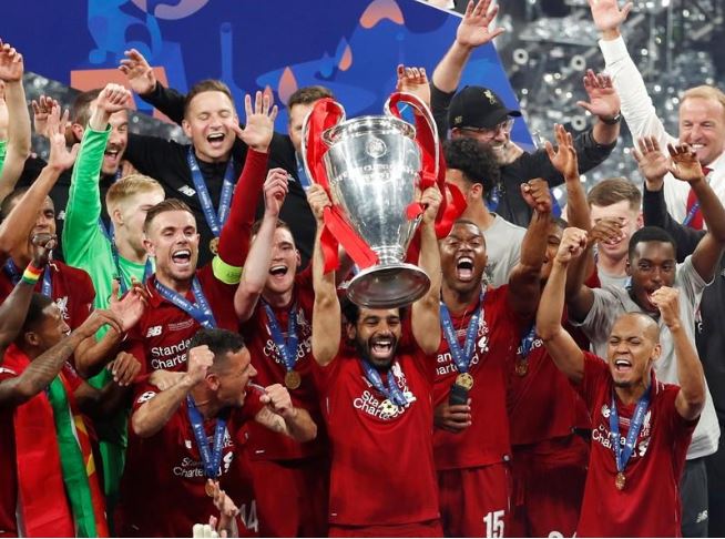 Soccer Football - Champions League Final - Tottenham Hotspur v Liverpool - Wanda Metropolitano, Madrid, Spain - June 1, 2019 Liverpool's Mohamed Salah lifts the trophy as they celebrate winning the Champions League.