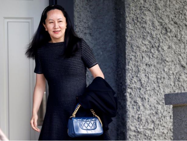 Huawei's Financial Chief Meng Wanzhou leaves her family home in Vancouver, British Columbia, Canada
