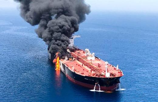 An oil tanker is seen after it was attacked at the Gulf of Oman.