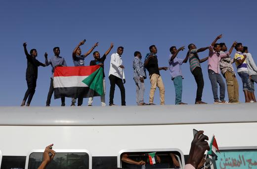 Protesters on a train from Atbara, the birthplace of an uprising that toppled Sudan's former President Omar al-Bashir.