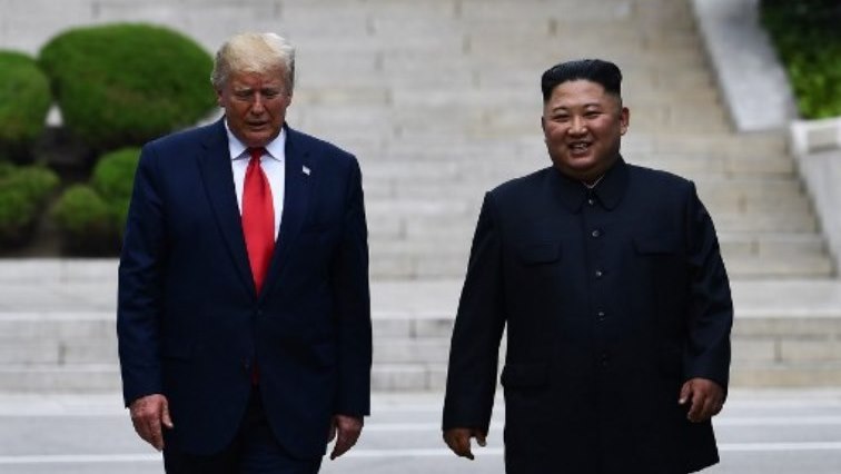 North Korea's leader Kim Jong Un walks southward with US President Donald Trump, after Trump briefly stepped into the north of the Military Demarcation Line that divides North and South Korea.