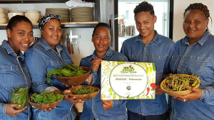 Employees accepting award for Best Vegetables Restaurant in South Africa 2018