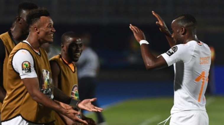 Ivory Coast's forward Maxwel Cornet celebrates his goal with teammates during the 2019 Africa Cup of Nations (CAN) Group D football match between Namibia and Ivory Coast.