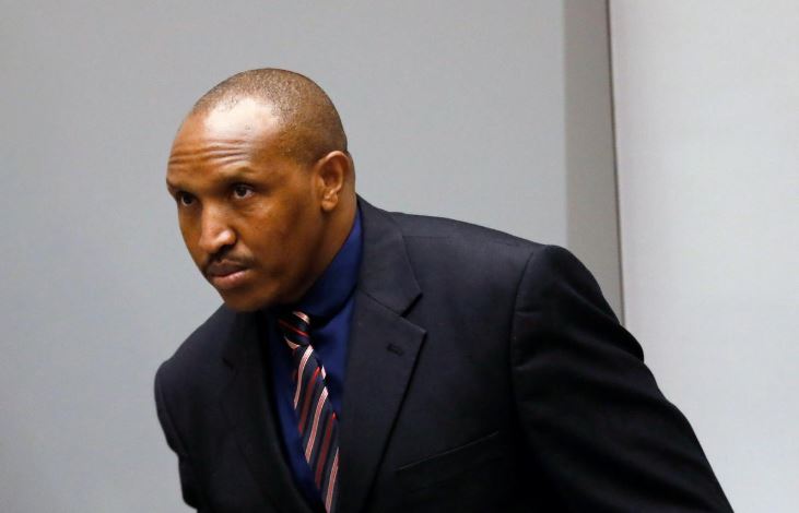 Congolese warlord Bosco Ntaganda stands in the courtroom of the ICC