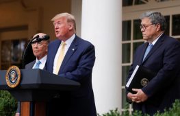 U.S. President Donald Trump stands with Commerce Secretary Wilbur Ross and Attorney General Bill Barr to announce his administration's effort to add a citizenship question to the 2020 census during an event in the Rose Garden of the White House.