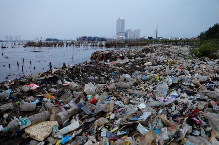 Rubbish, most of which is plastics, is seen along a shoreline in Jakarta, Indonesia.