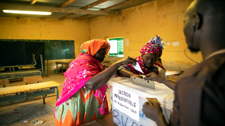 Senegalese women cast their ballots in the presidential elections in February.