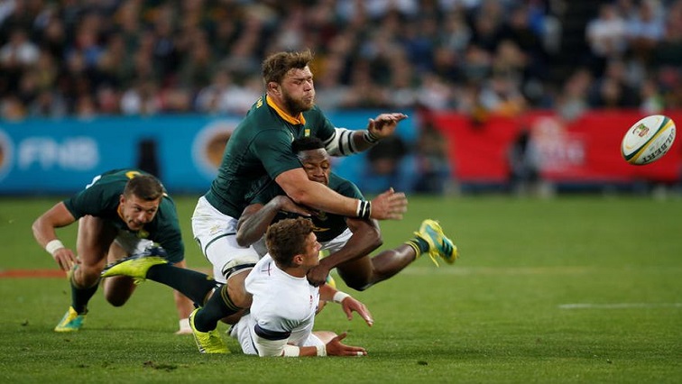 England’s Henry Slade in action with South Africa’s Duane Vermeulen.