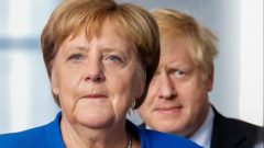 German Chancellor Angela Merkel and Britain's Prime Minister Boris Johnson attend a news conference at the Chancellery in Berlin