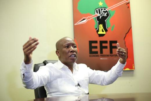 Julius Malema, the head of South Africa's Economic Freedom Fighters party (EFF), gestures during an interview.