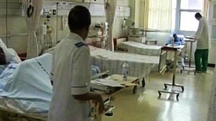 Hospital beds, nurse and doctor