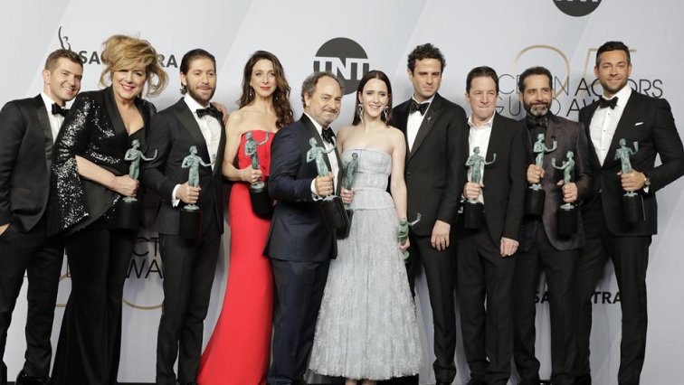 FILE PHOTO- The cast of "The Marvelous Mrs. Maisel" poses backstage with their award for Outstanding Performance by an Ensemble in a Comedy Series.