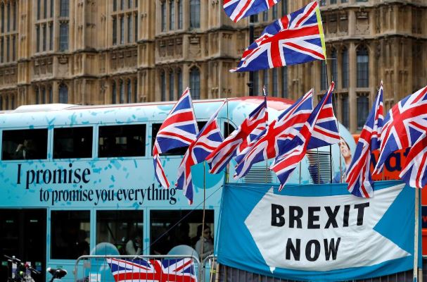 A passenger bus passes a pro-Brexit demonstration in Westminster, London, Britain, September 30, 2019.