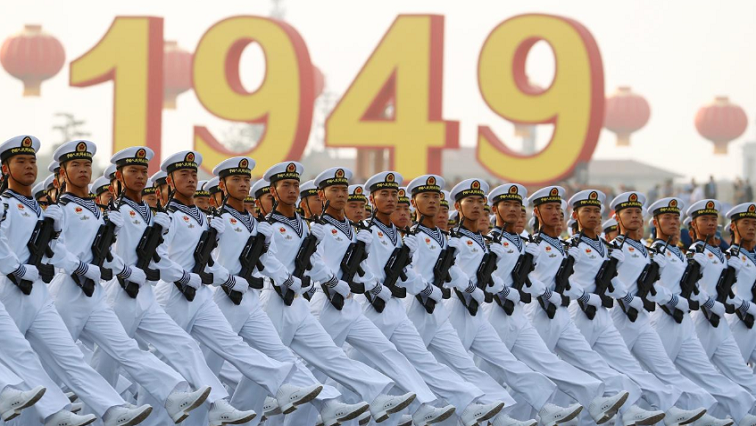 Soldiers of People's Liberation Army (PLA) march in formation past Tiananmen Square during a rehearsal before a military parade marking the 70th founding anniversary of People's Republic of China, on its National Day in Beijing, China October 1, 2019