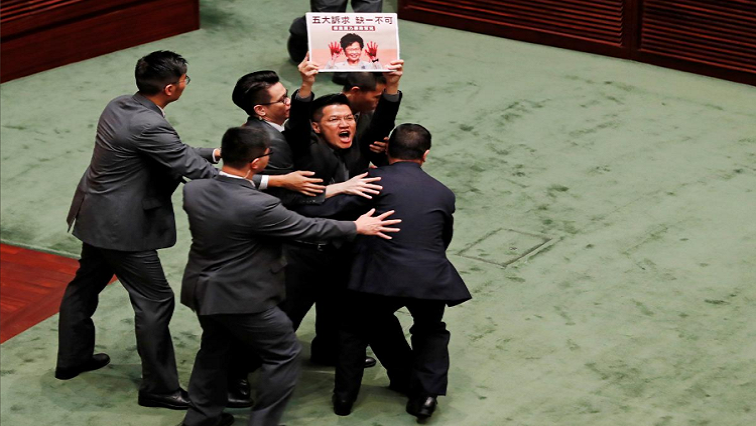 Pro-democracy lawmakers accused Carrie Lam of having “blood on her hands” for not meeting protesters’ demands to end the unrest, introducing colonial-era emergency laws and allowing police to use what activists say is excessive force.