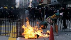 Anti-government demonstrators set a barricade on fire during a protest in Hong Kong, China.