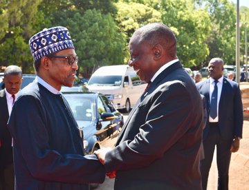 Buhari and Ramaphosa shaking hands
