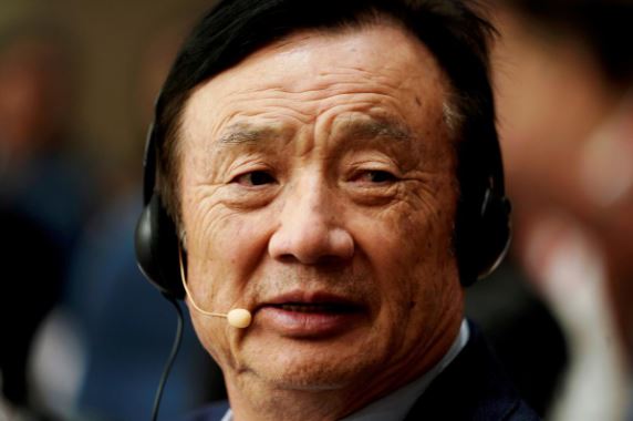 Huawei founder Ren Zhengfei attends a panel discussion at the company headquarters in Shenzhen.