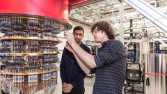 A handout picture from October 2019 shows Sundar Pichai and Daniel Sank (R) with one of Google's Quantum Computers in the Santa Barbara lab, California.
