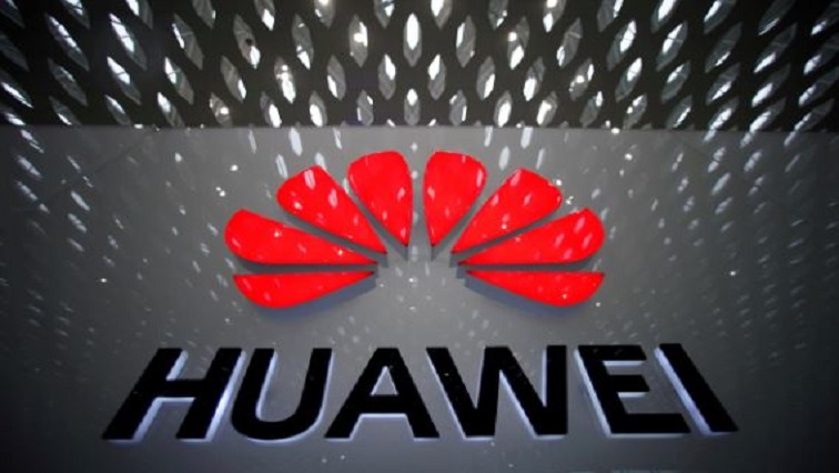 A Huawei company logo is pictured at the Shenzhen International Airport in Shenzhen, Guangdong province.