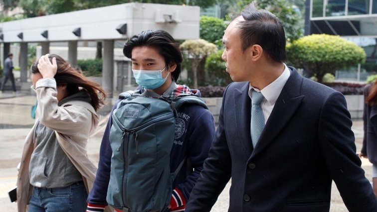 Tsang Chi-Kin (C), who was shot by a police officer during a protest, arrives for a court hearing in Hong Kong, China.